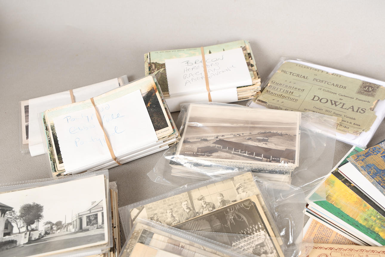 A COLLECTION OF MOSTLY EARLY 20TH CENTURY POSTCARDS (QTY). Books, Maps ...