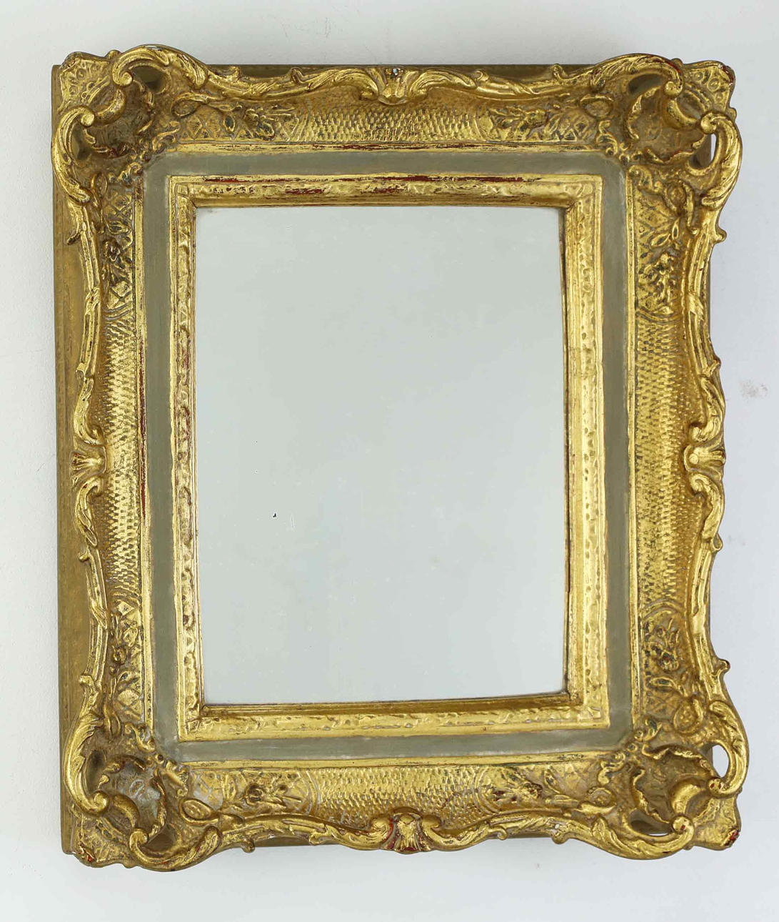 A rococo style mirror, gilt, 20th century.