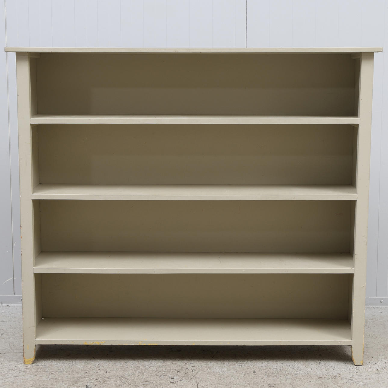 A bookcase, painted wood, 20th century.