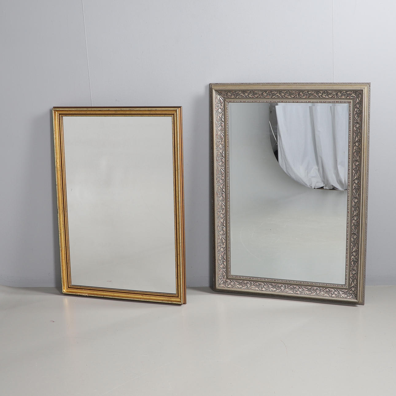 TWO WALL MIRRORS.