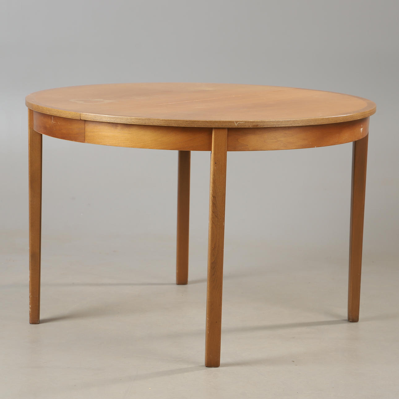 A walnut dining table, second half of the 20th century.