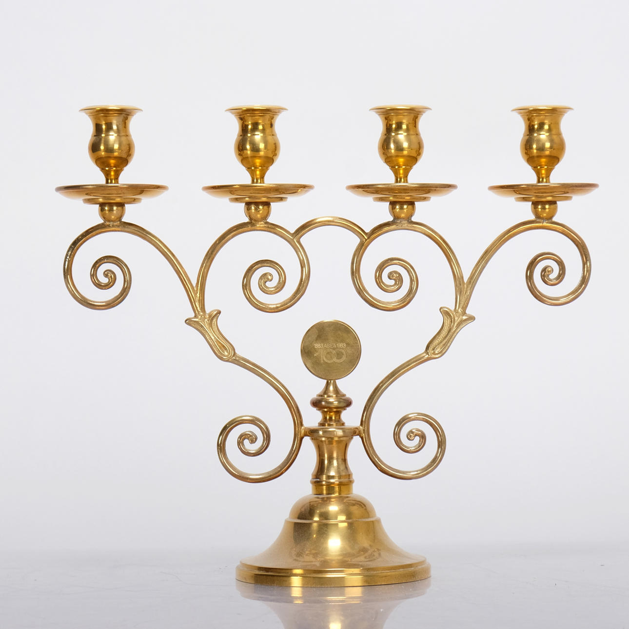 A “Mistel” candelabra, Brass, Skultuna.