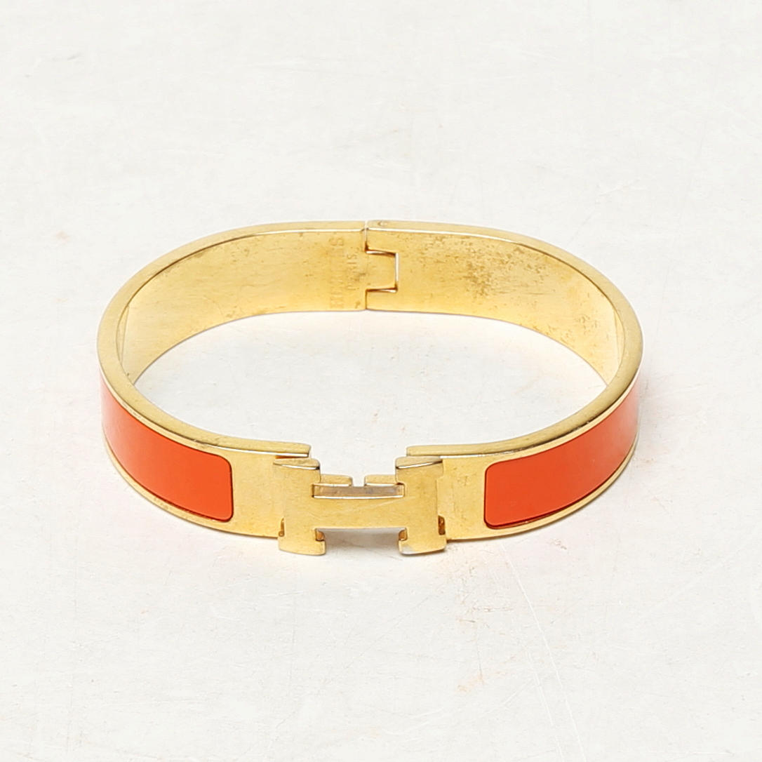 A metal bracelet, Hermes.