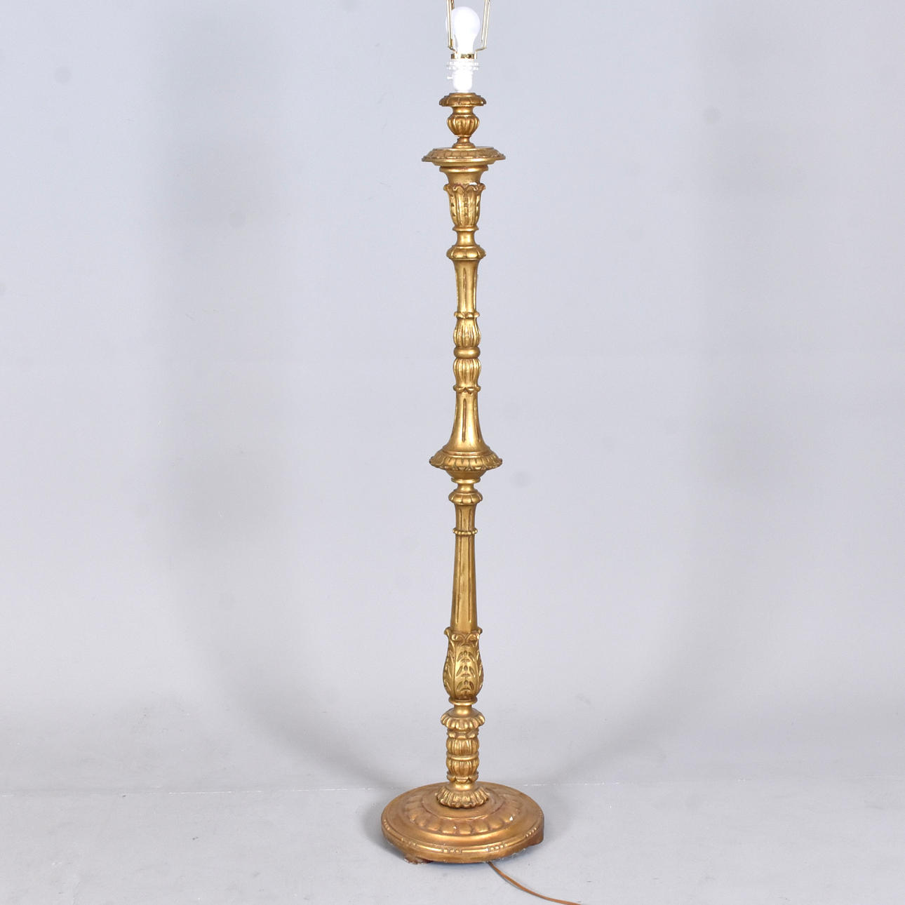 FLOOR LAMP, cut and bronzed wood.