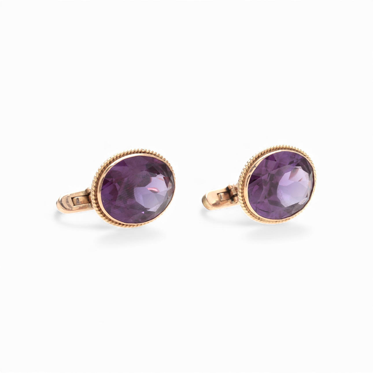 Gold and synthetic corundum cufflinks.