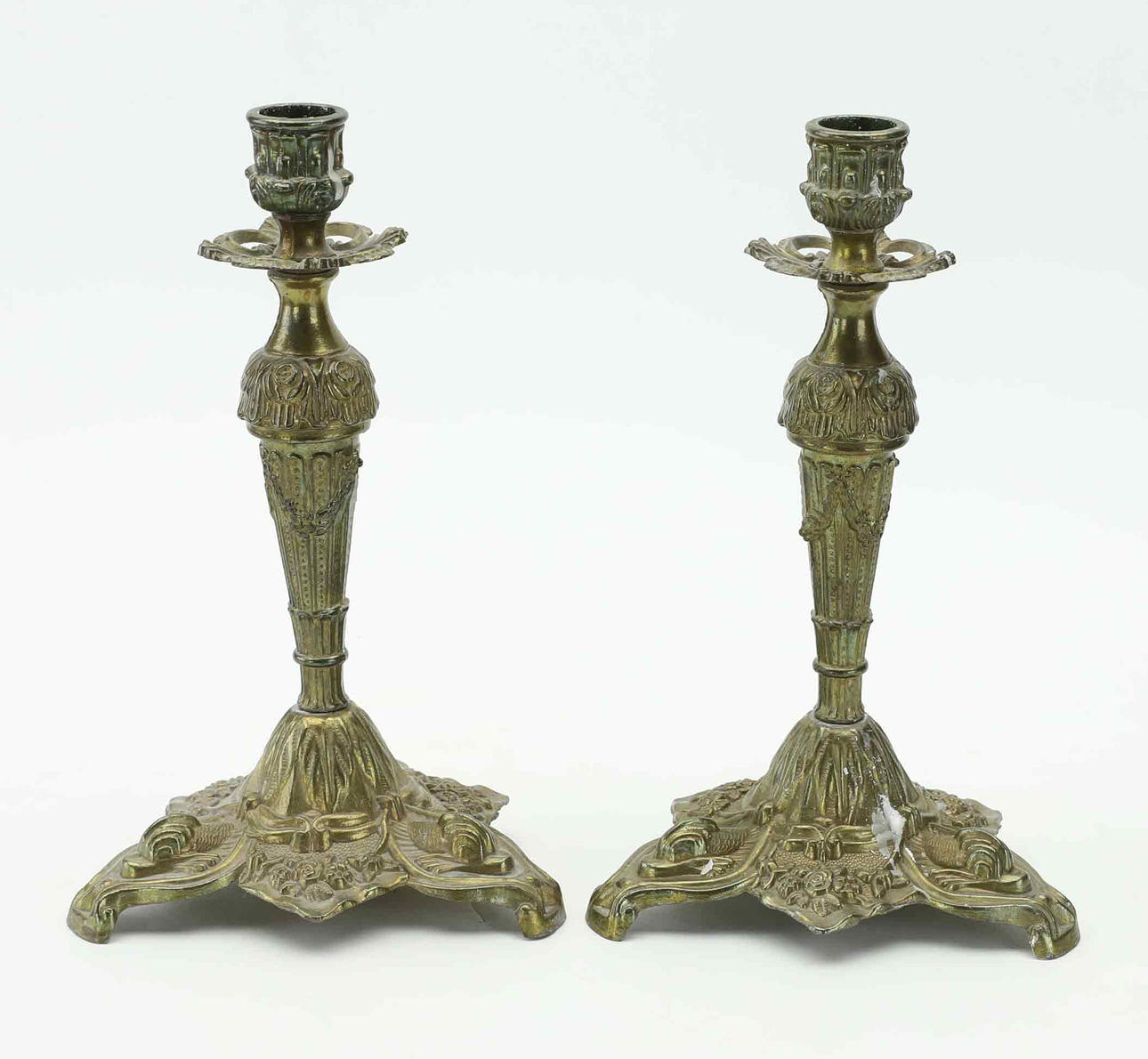 A pair of 20th century Rococo candlesticks.