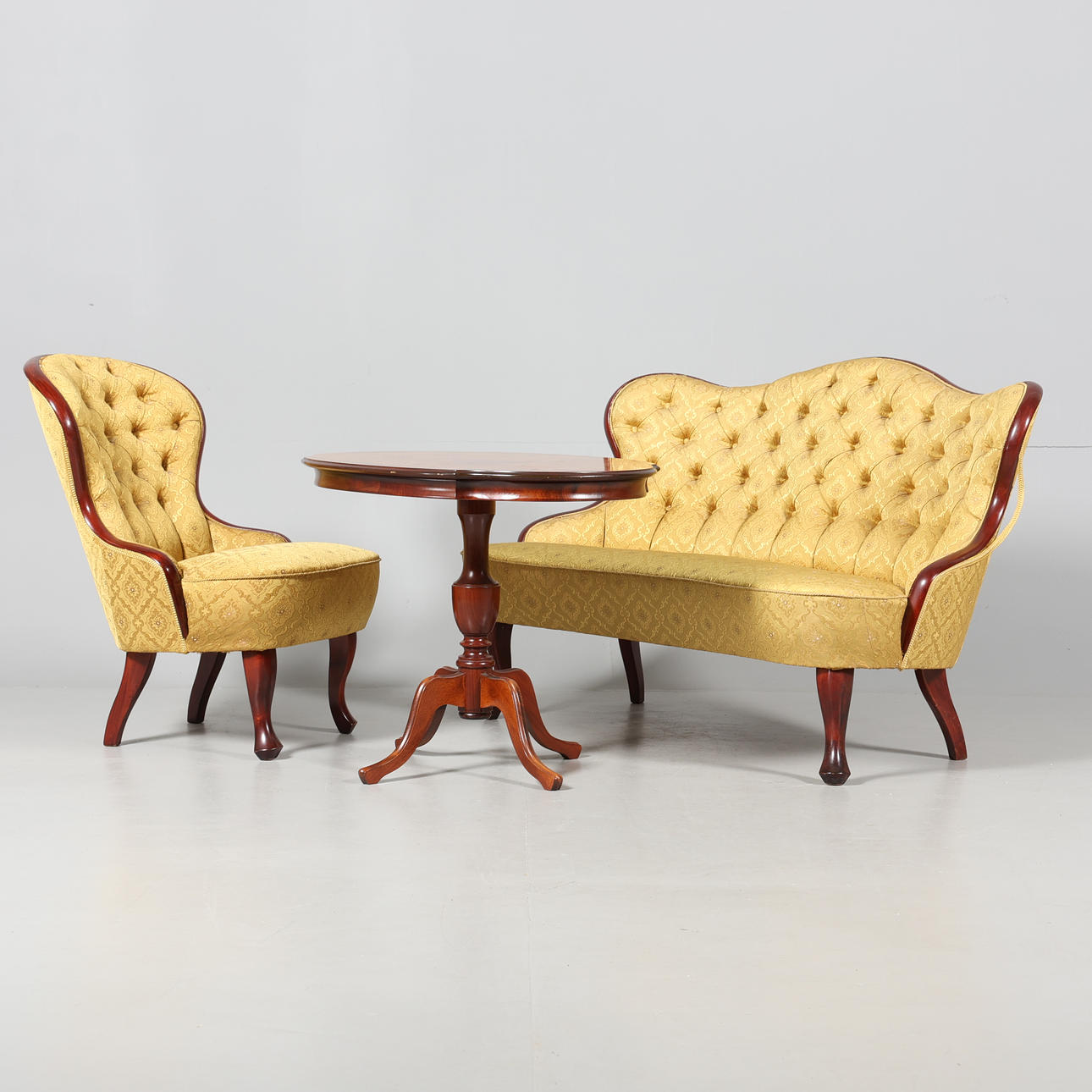 A three-piece rococo style seating area, 20th century.