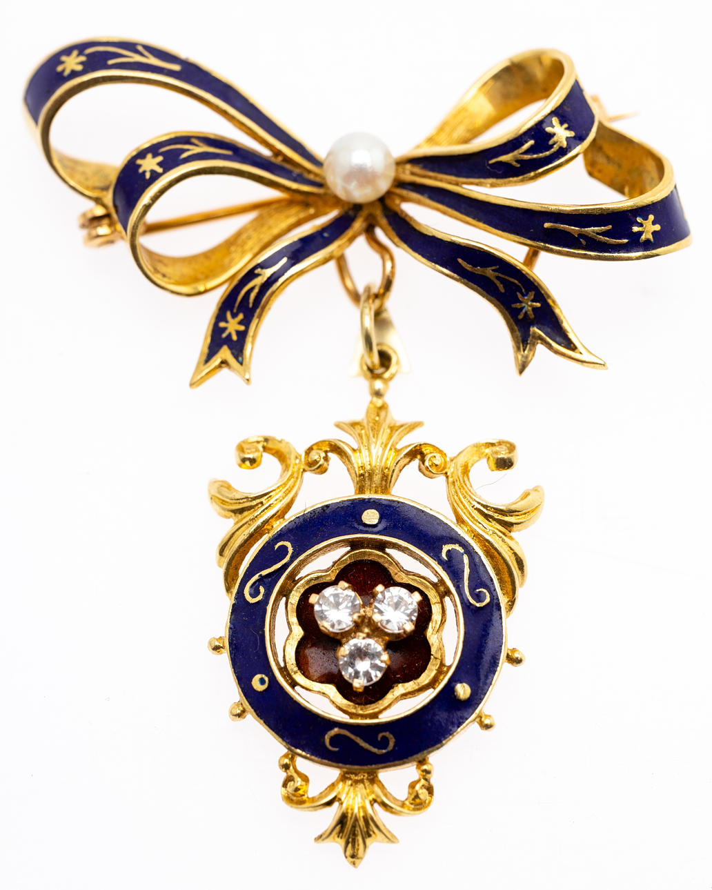 brooch with pendant.