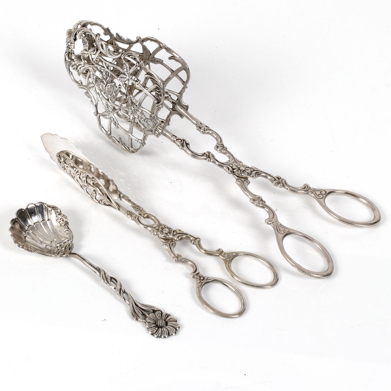 PLIERS, 2 pcs. and A SILVER STORAGE SPOON, Gewe Silvervarfabriken Ab, Malmö. Second half of the 20th century.