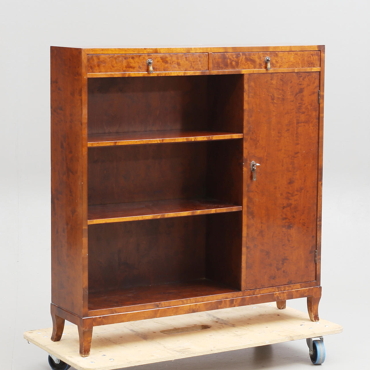 Bookcase with cupboards and drawers, 1930's.