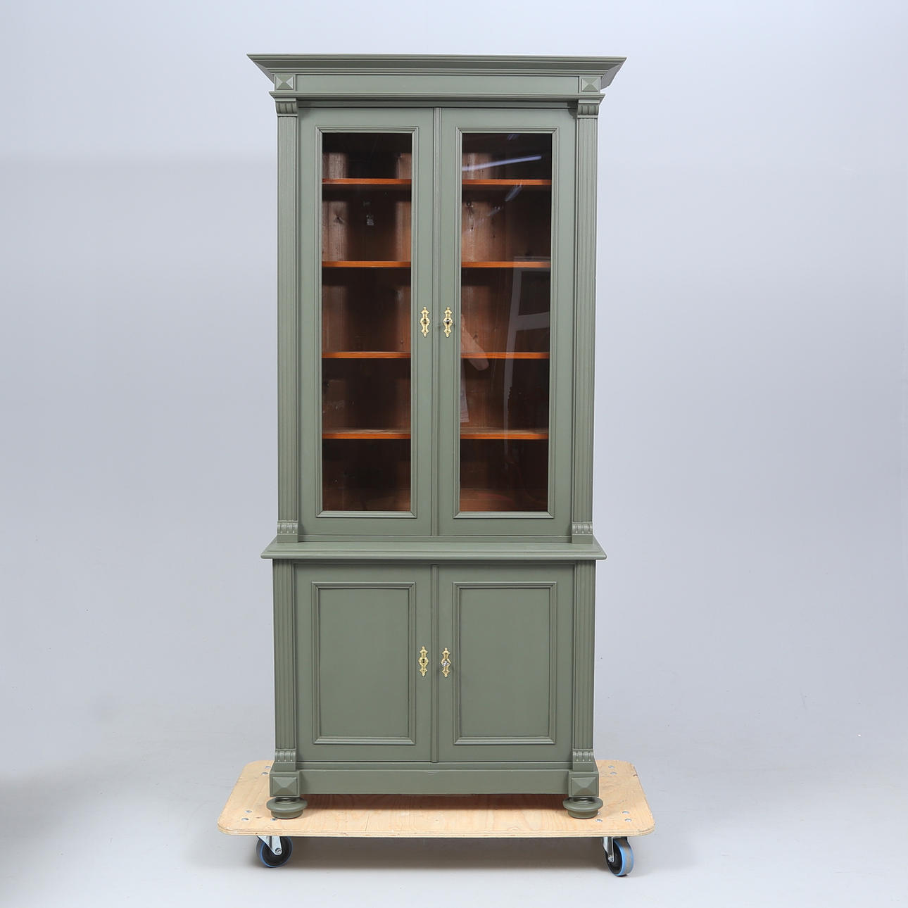 A painted bookcase, late 19th century.