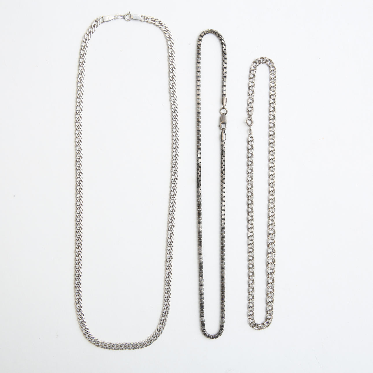 CHAINS, 3 pcs, silver, approx. 61 grams.
