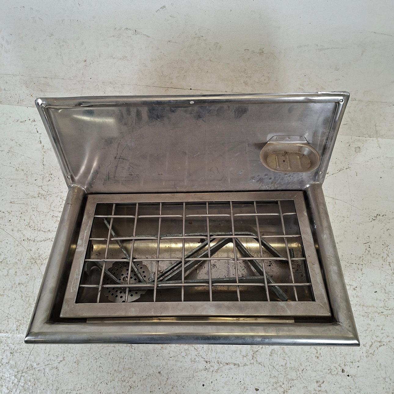 A 20th-century stainless steel LAUNDRY.