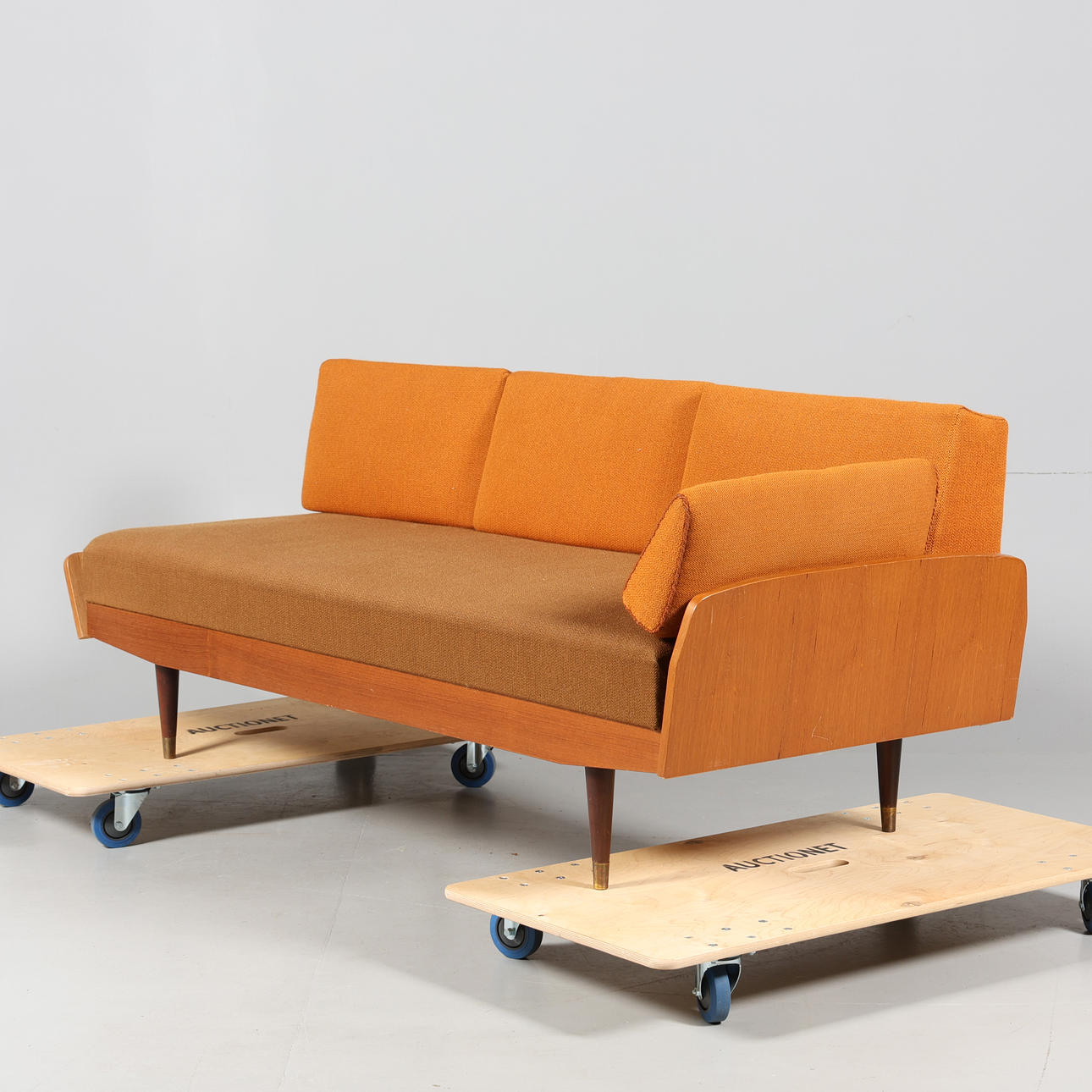 A 1950s/60's teak daybed and sofa bed.