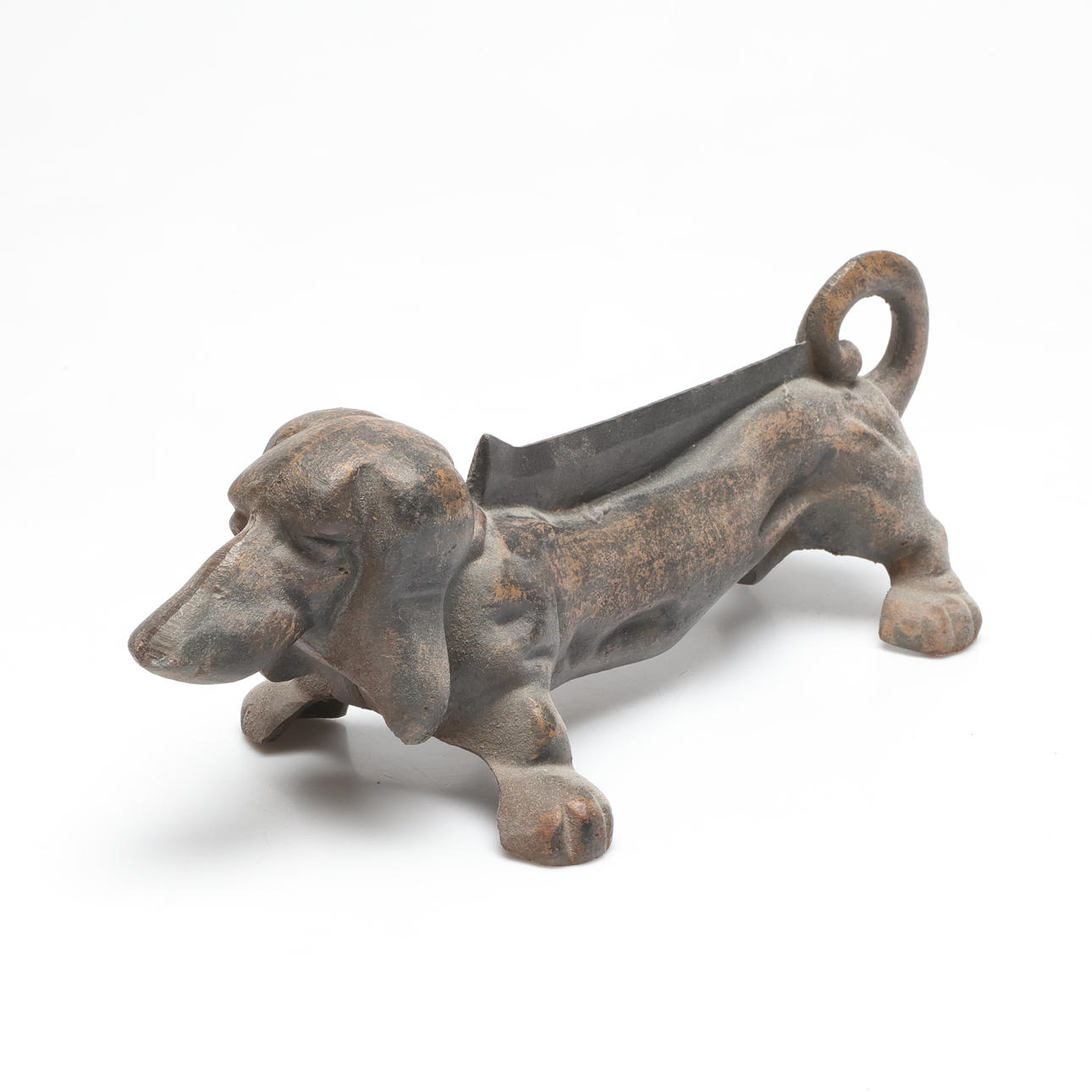 A cast metal fire dog, 1900/2000's.