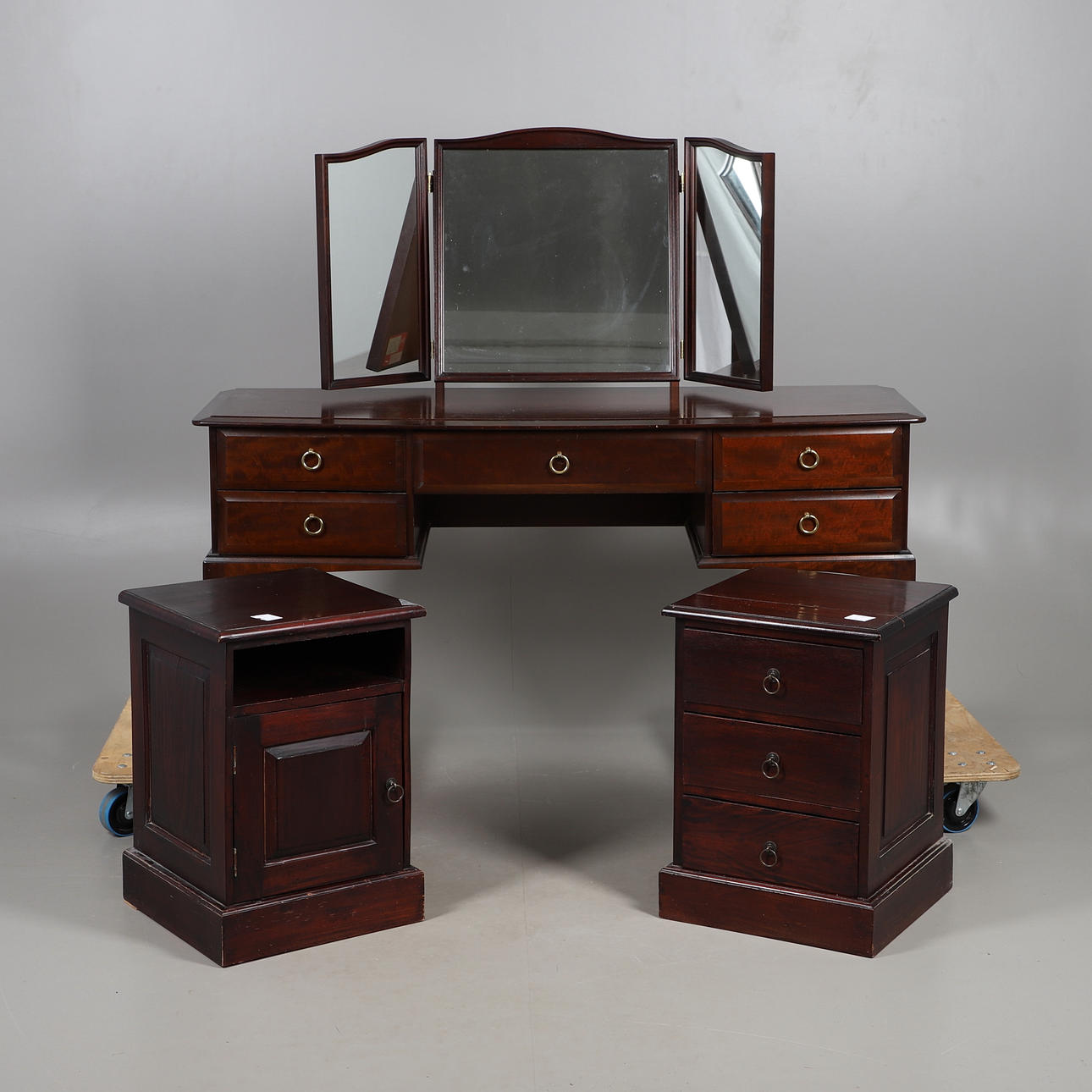 STAG DRESSING TABLE WITH A PAIR OF BEDSIDE TABLES.