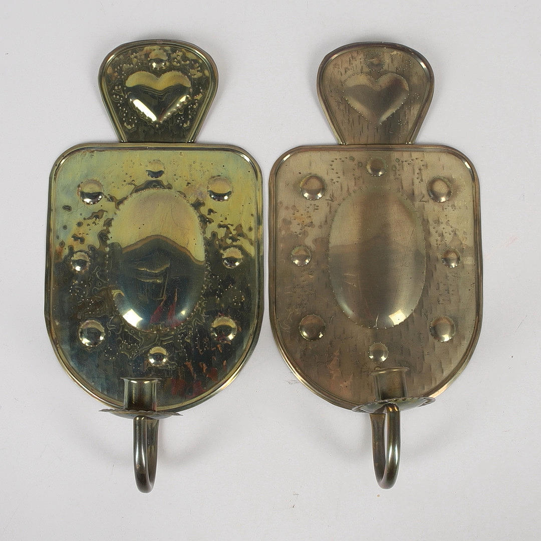 A pair of brass candlesticks.