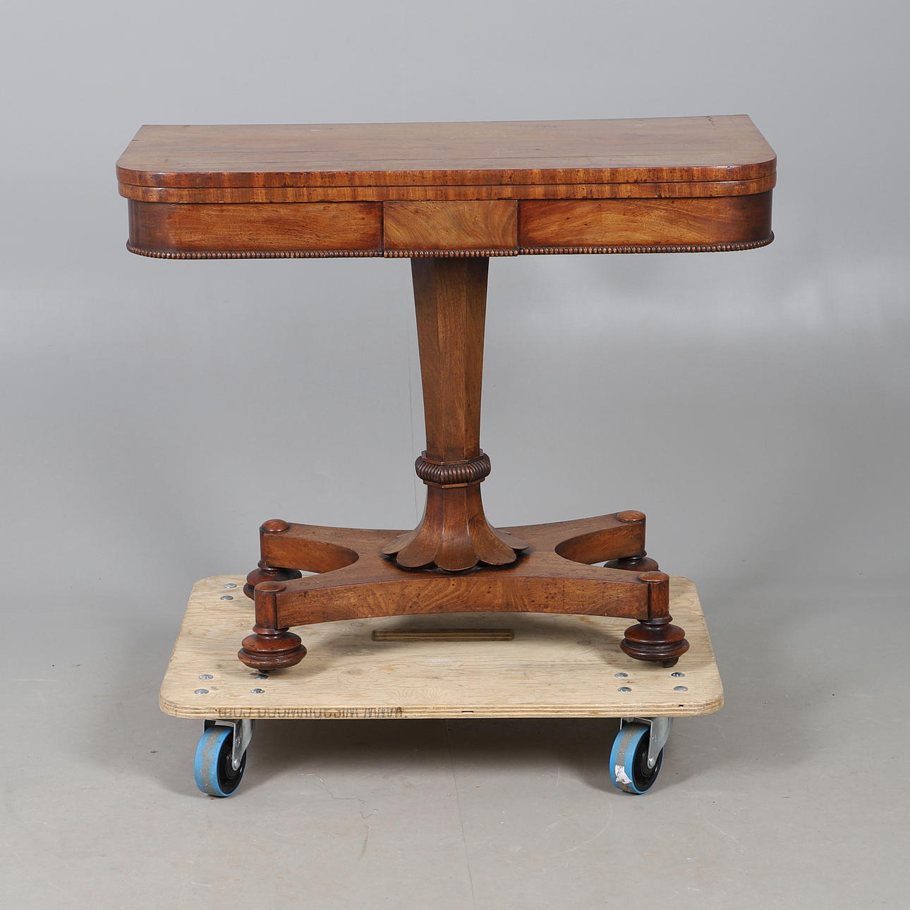 A GEORGE IV MAHOGANY CARD TABLE.