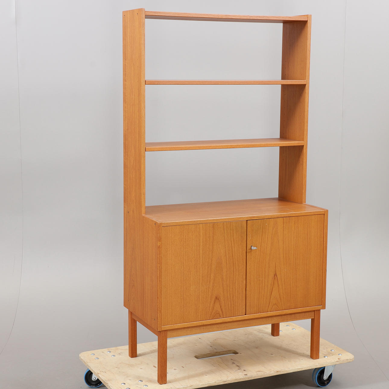 Bookcase with cupboard, teak, 1970s.