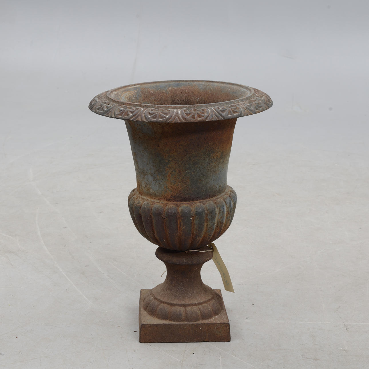 A cast iron urn.