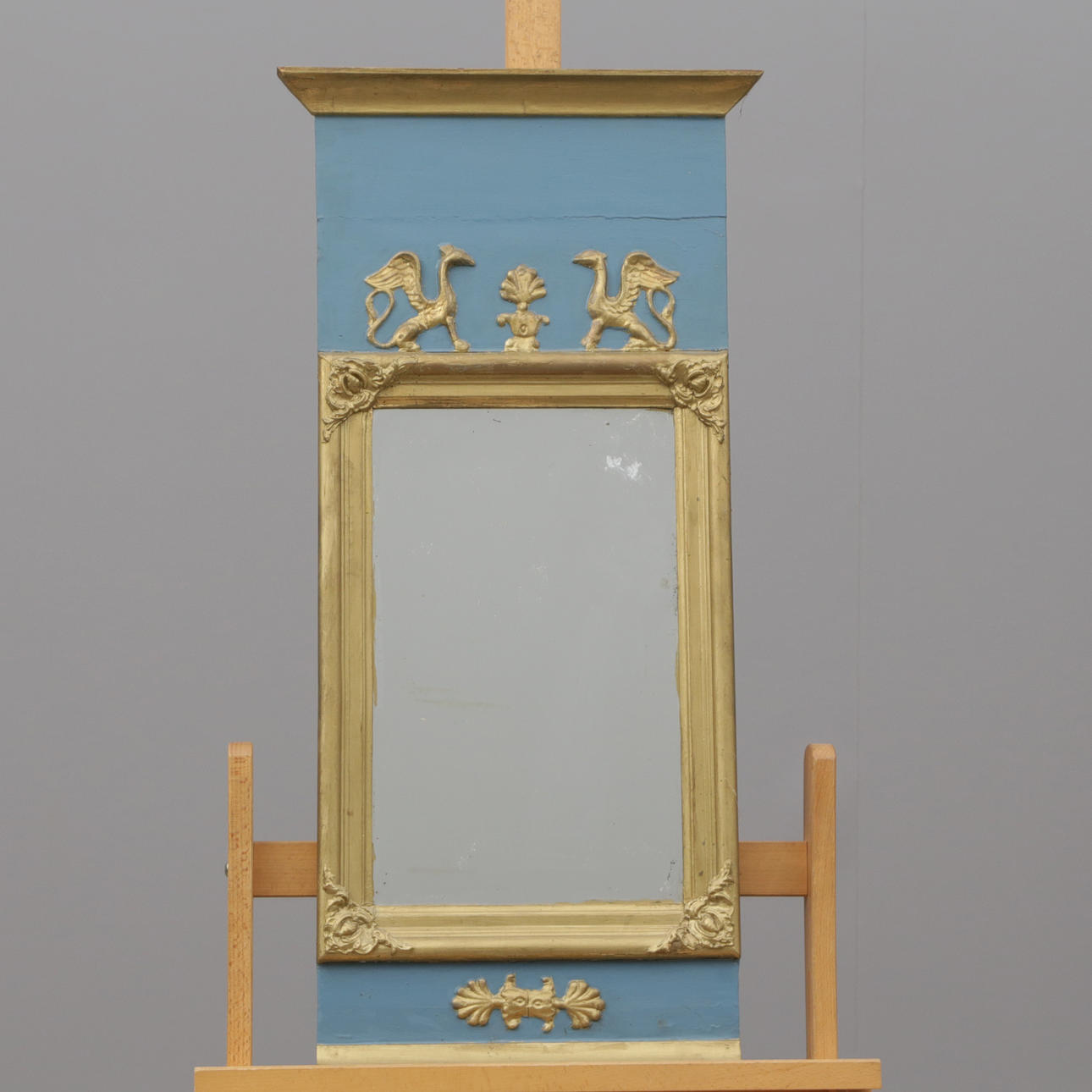 A 19th century Empire mirror.