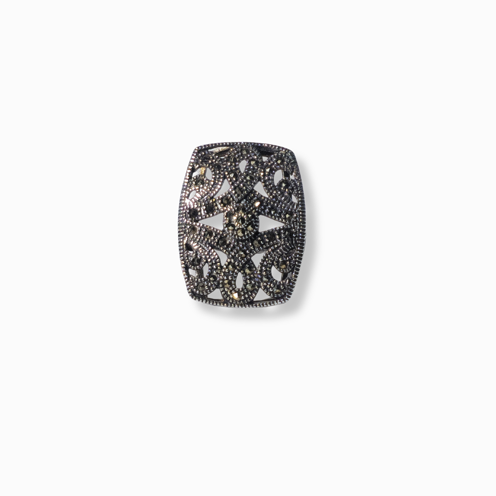 SILVER RING WITH MARQUESITAS.