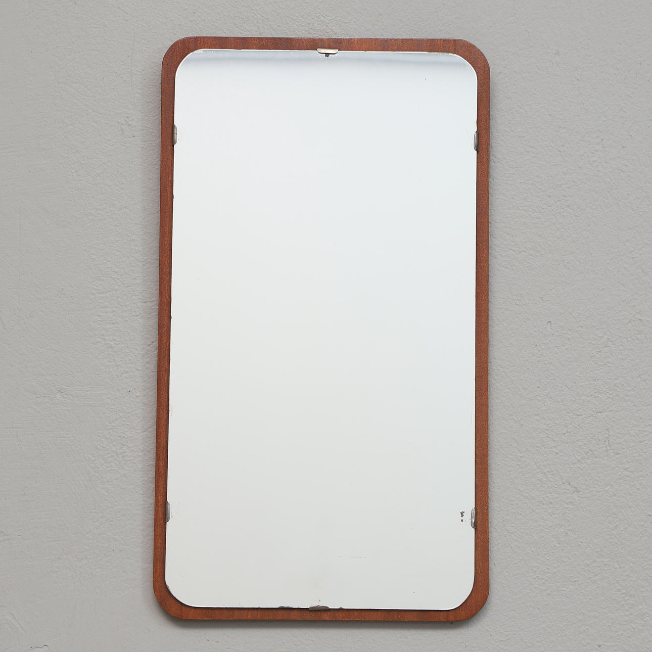 A teak mirror, 1950s/1960s.