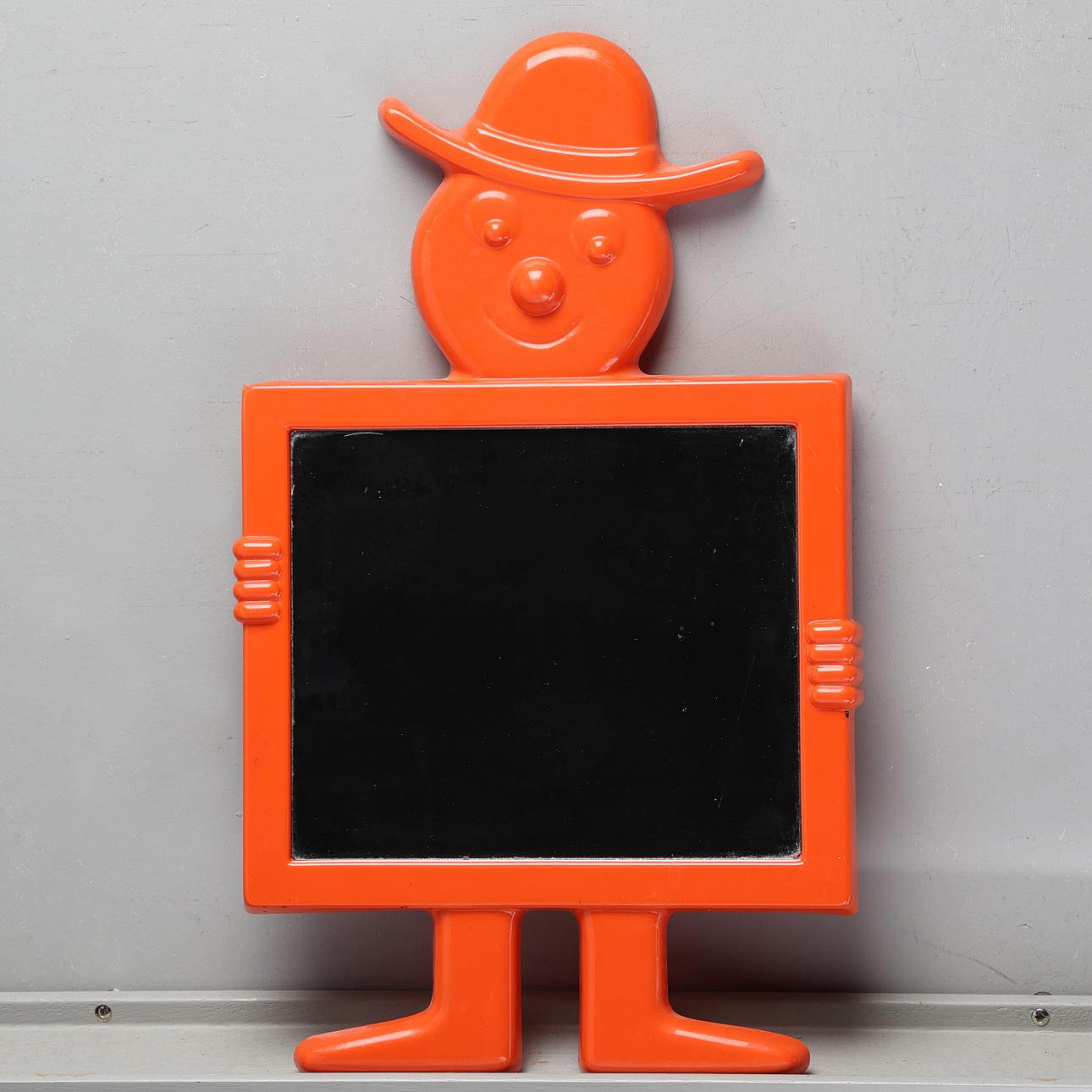 A plastic mirror from Poss, Denmark 70's.