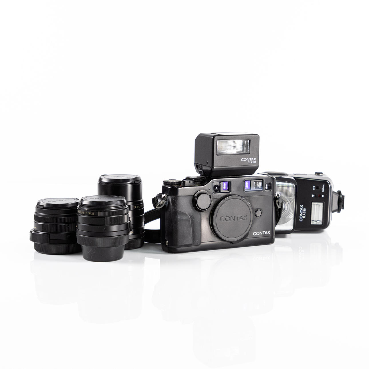 CONTAX. G2, 3 lens, 2 flash, 90s, Japan.