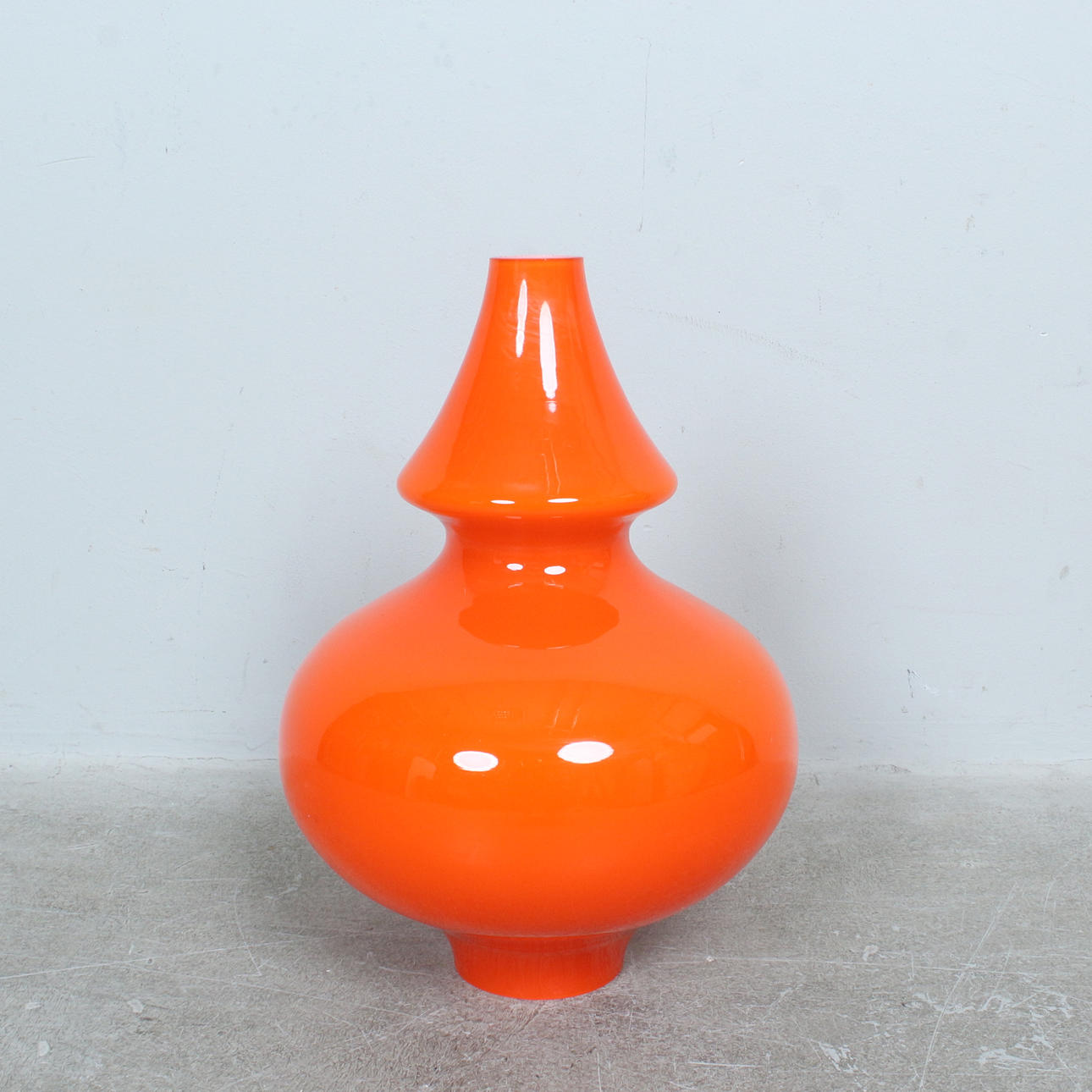 Orange glass lampshade.