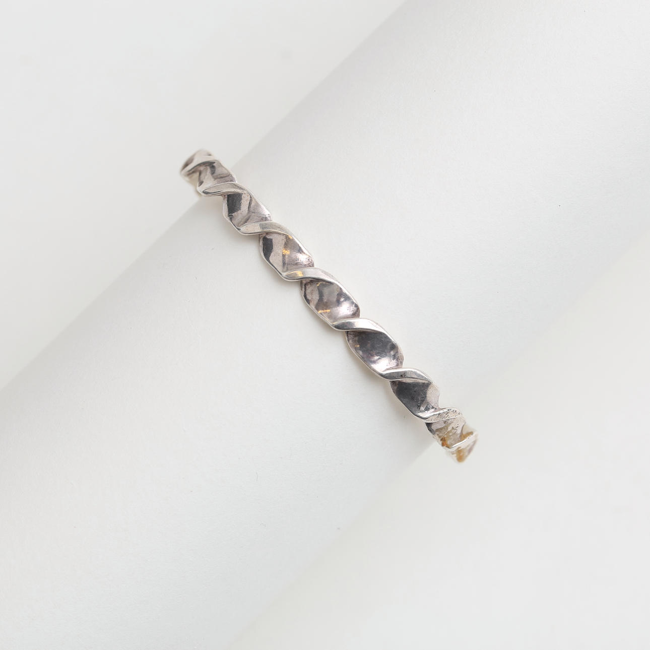 A silver bangle, Alton, 1975.