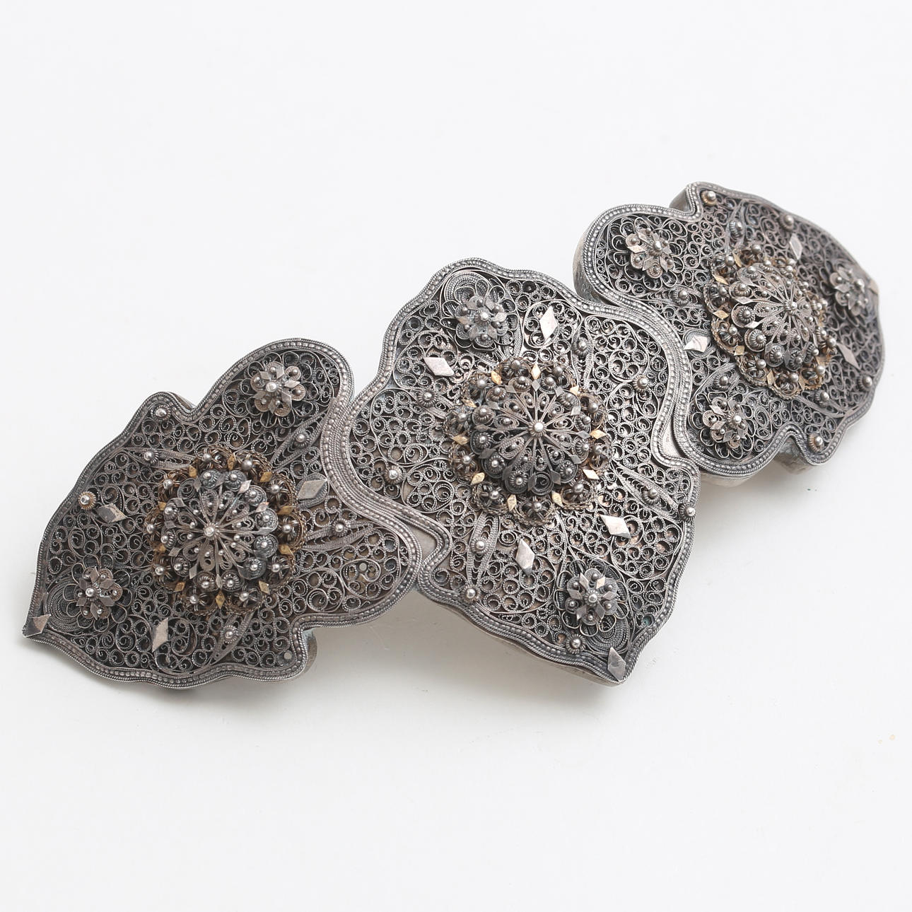 FILIGREE BUCKLE, partly gilt silver.