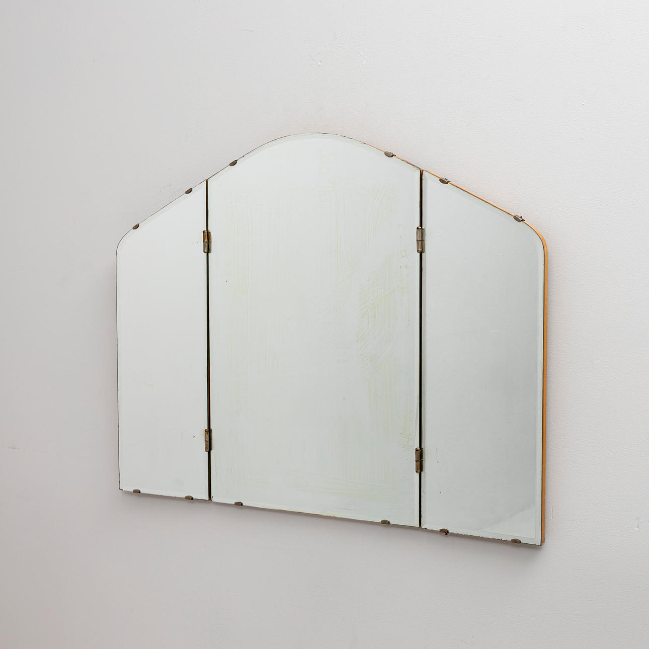 A folding three-piece mirror, 1940s/1950s.