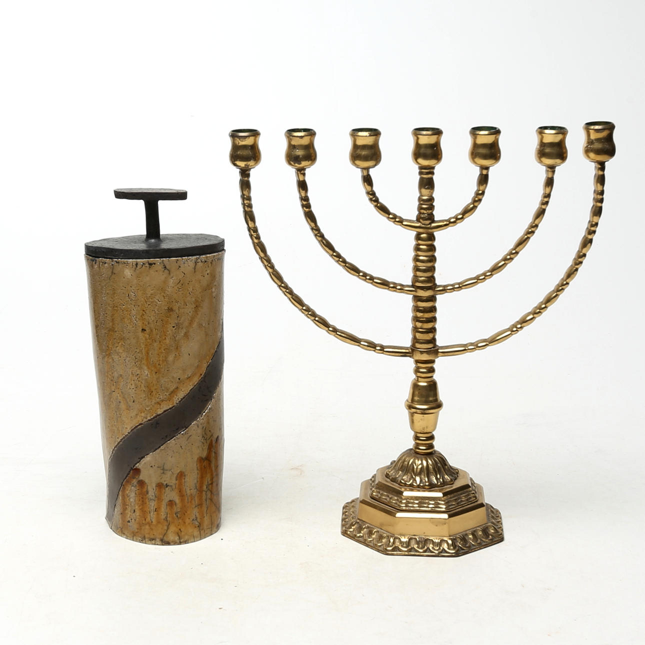 AN Ore CANDLESTICK, A CERAMIC LOCK-URN.