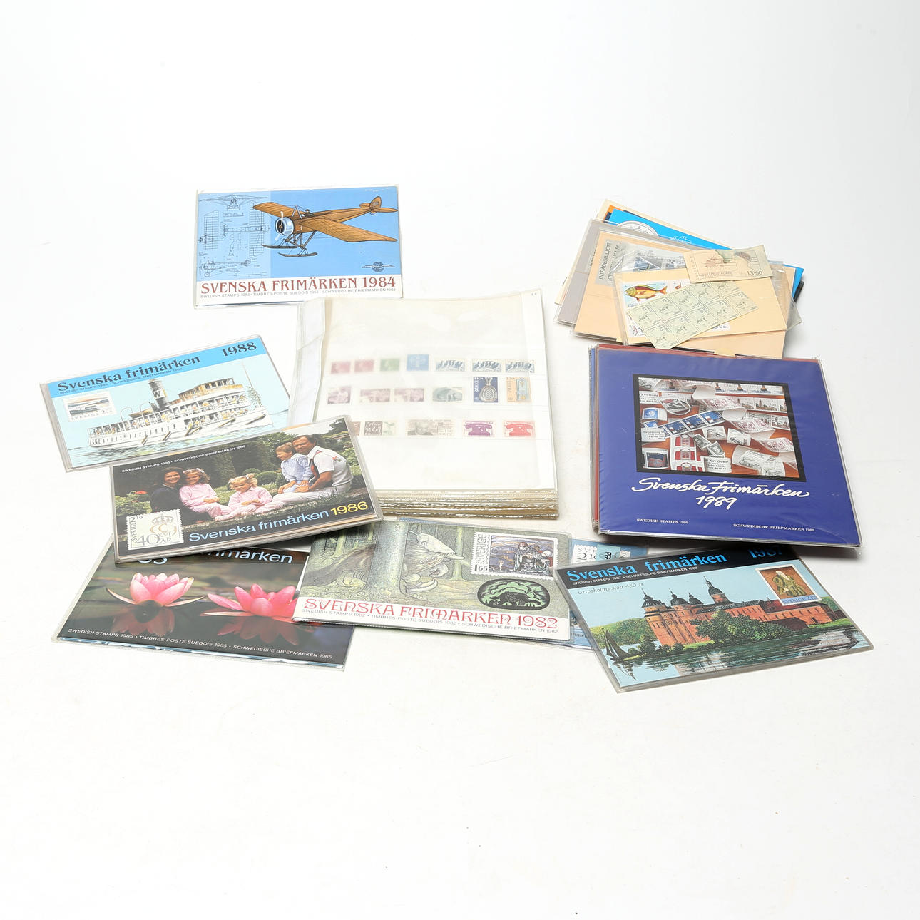 POSTAGE STAMPS, in box, postSverige, originally year sets.