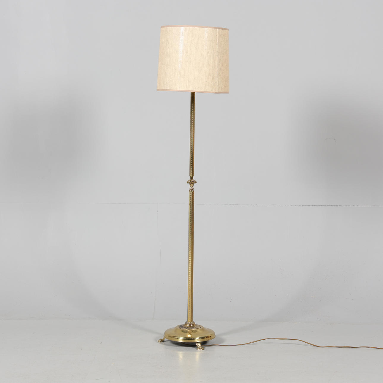 A metal floor lamp, 20th century.