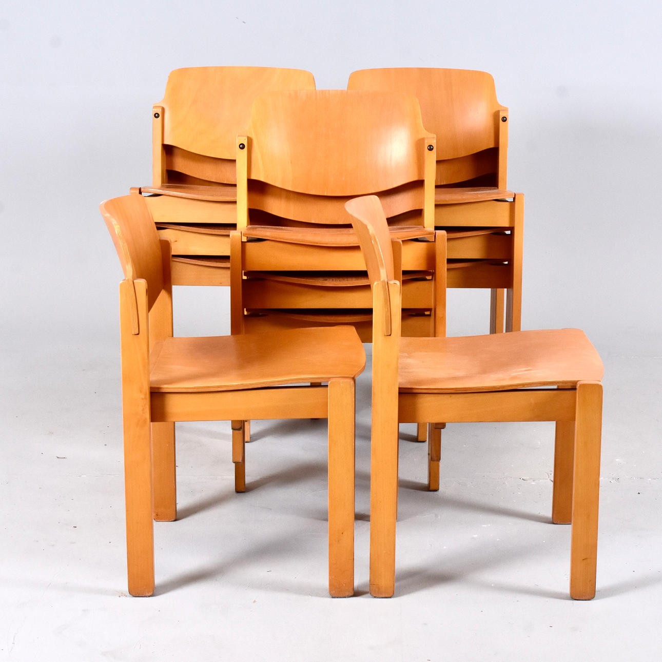 11 stackable chairs, second half of the 20th century.