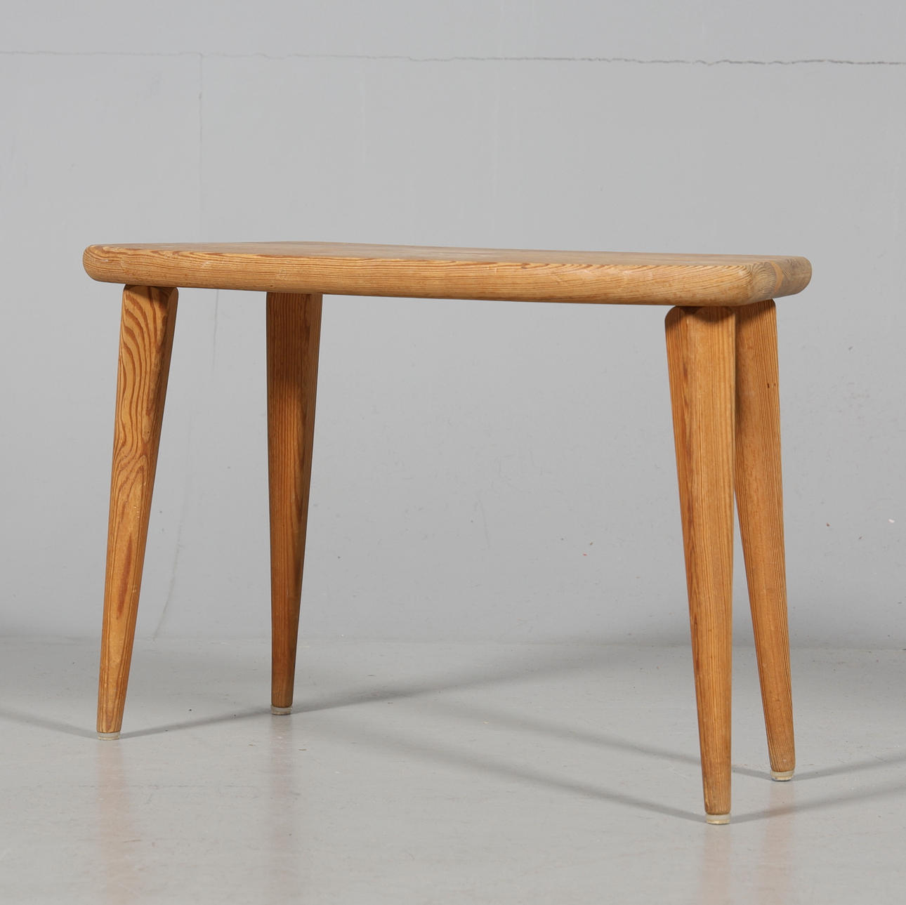 A pine stool, 20th century.