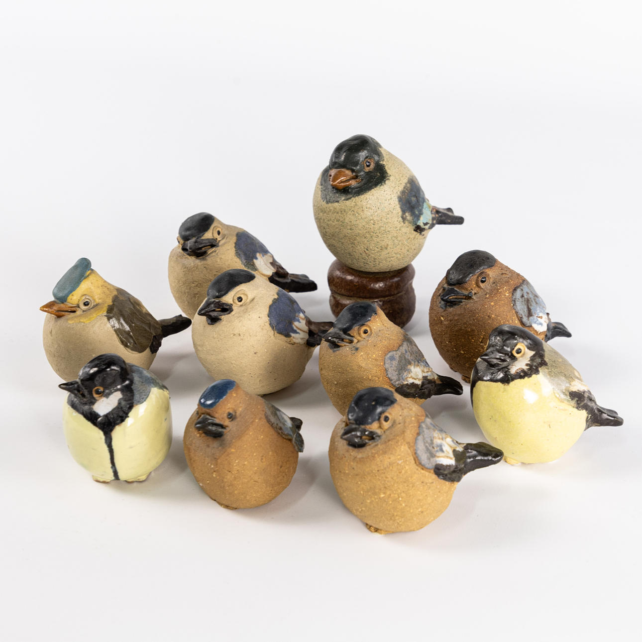 GUNNAR HANSSON, 10 birds, signed, highest 13 cm.