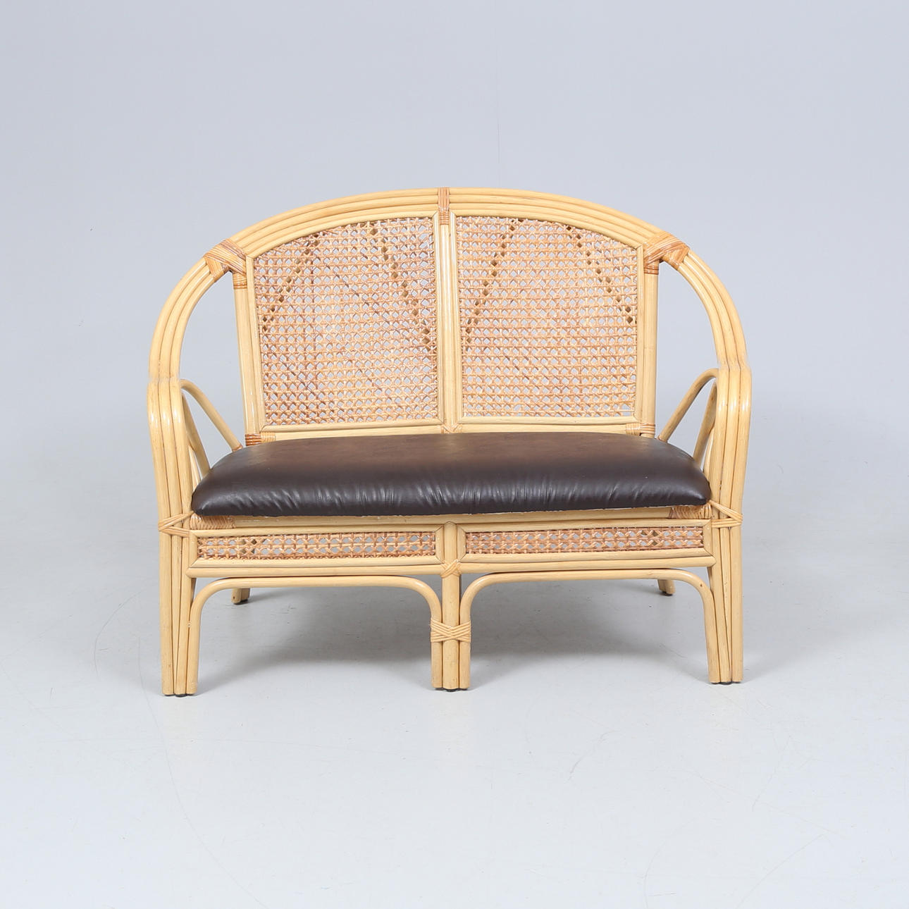 A 1900 century rattan sofa.