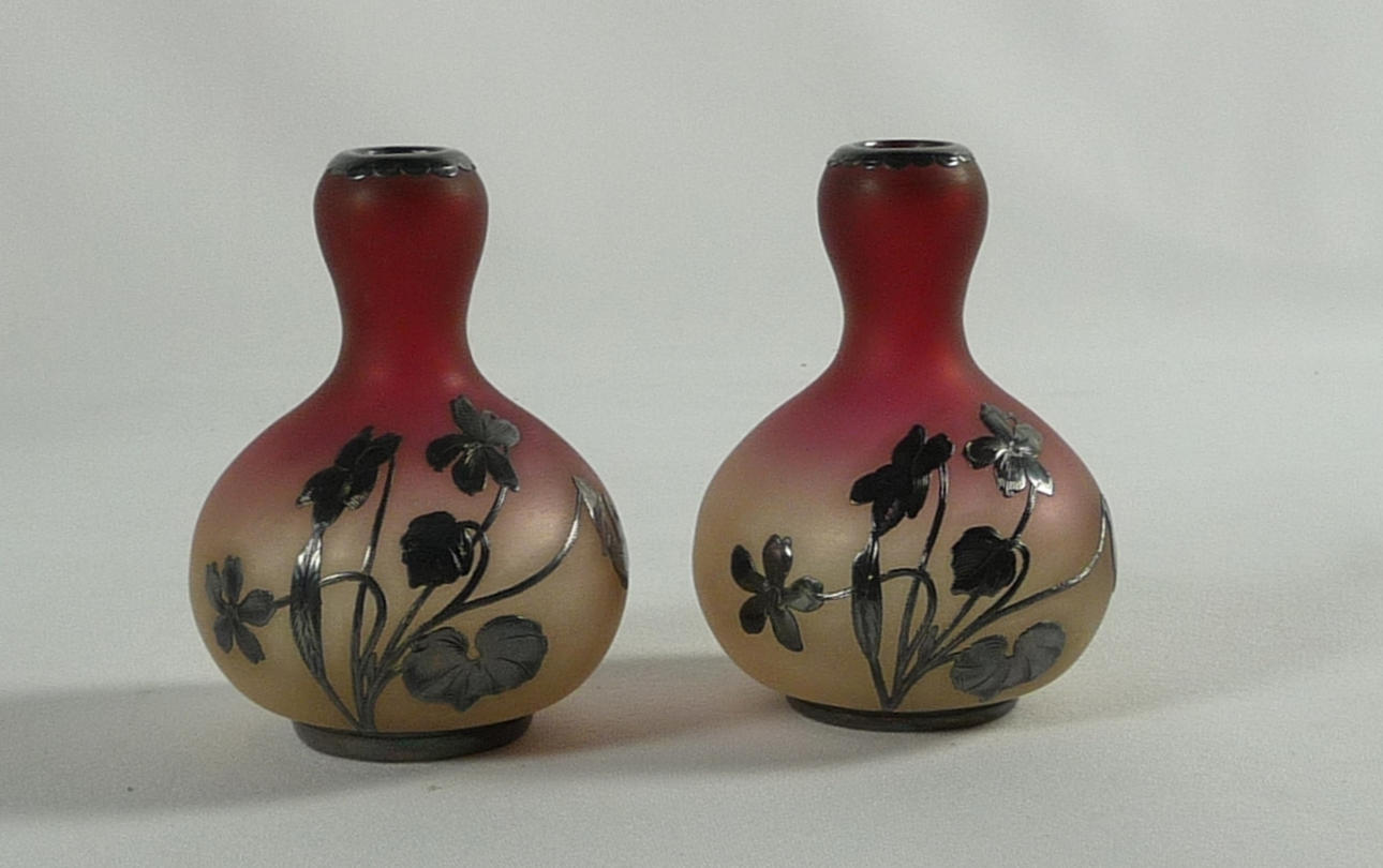 PAIR OF SMALL SILVER-PLATED VASES, circa 1900.
