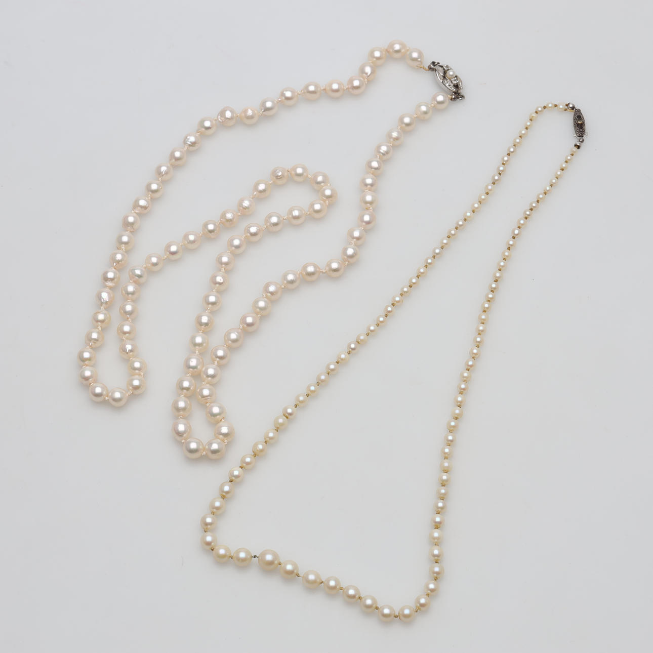 PEARL NECKLACES 2 pieces.