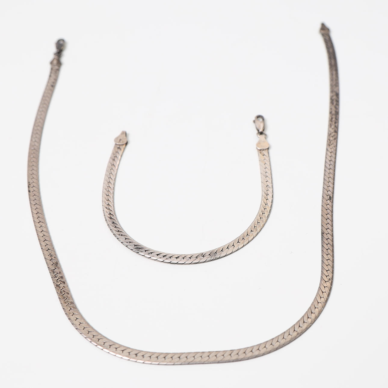 BRACELET AND NECKLACE, sterling silver.