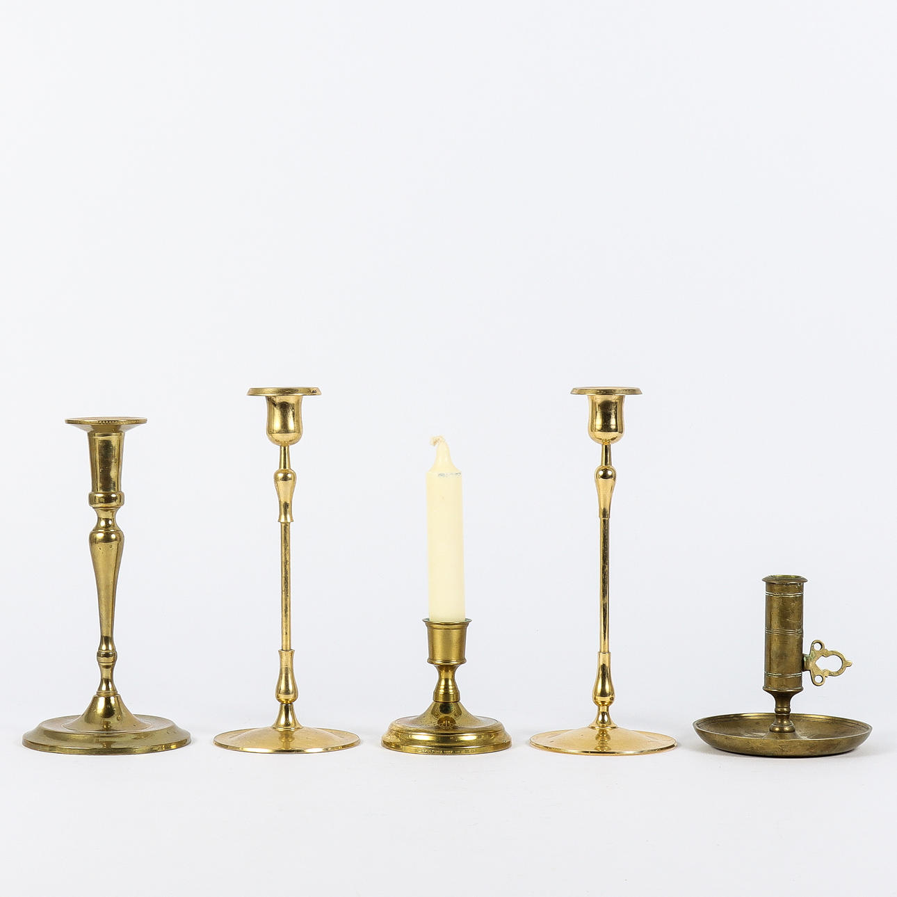 CANDLESTICKS 5 pieces brass.