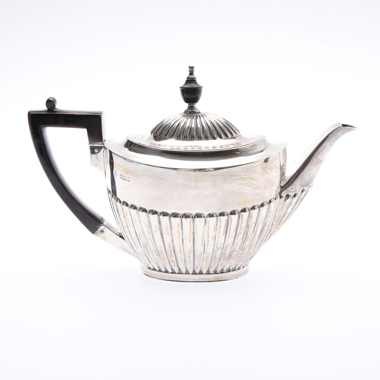LATE VICTORIAN SILVER TEAPOT.