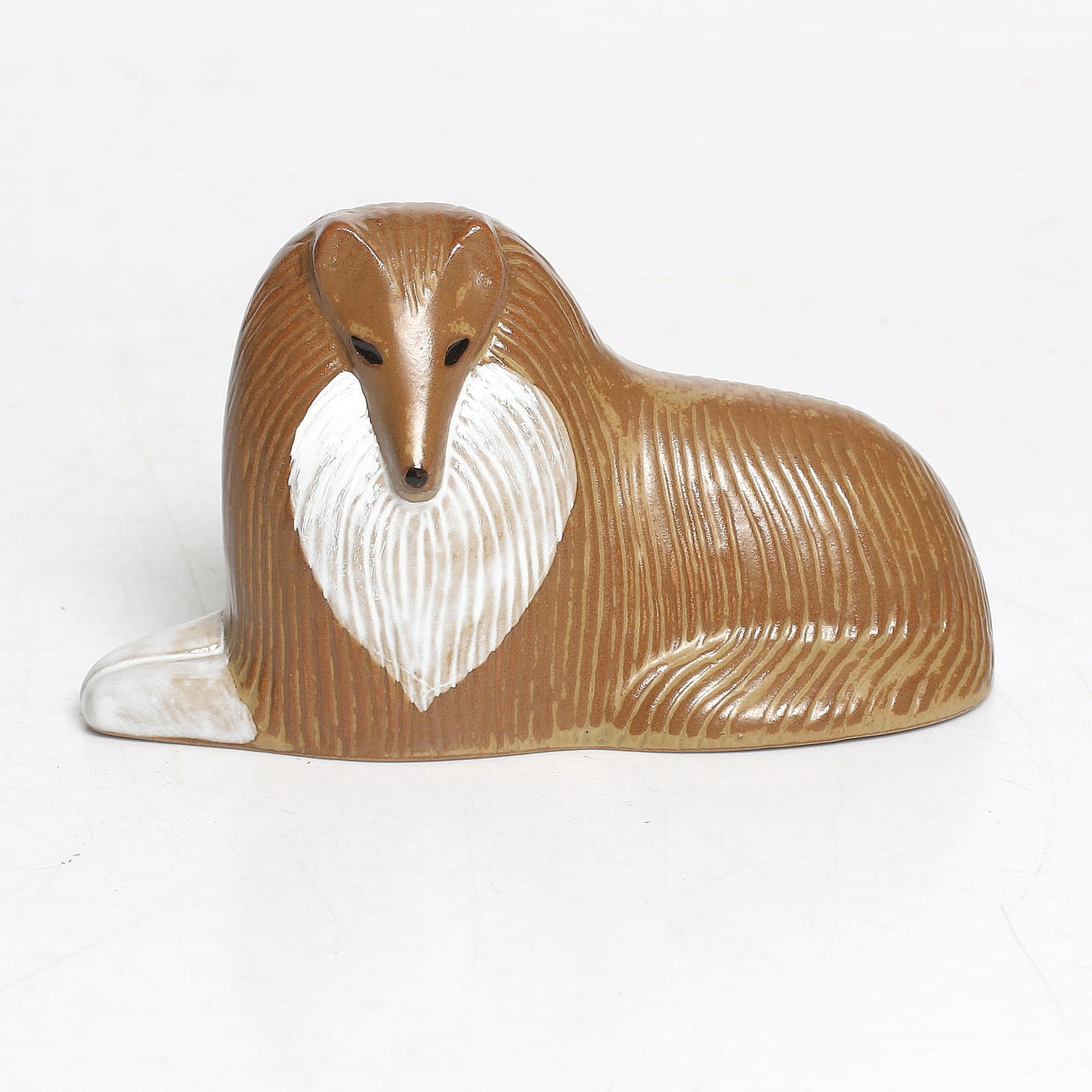 FIGURIN, keramik, "Collie", ur serien "VOV", Lisa Larson för Åhléns, 1900-tal.