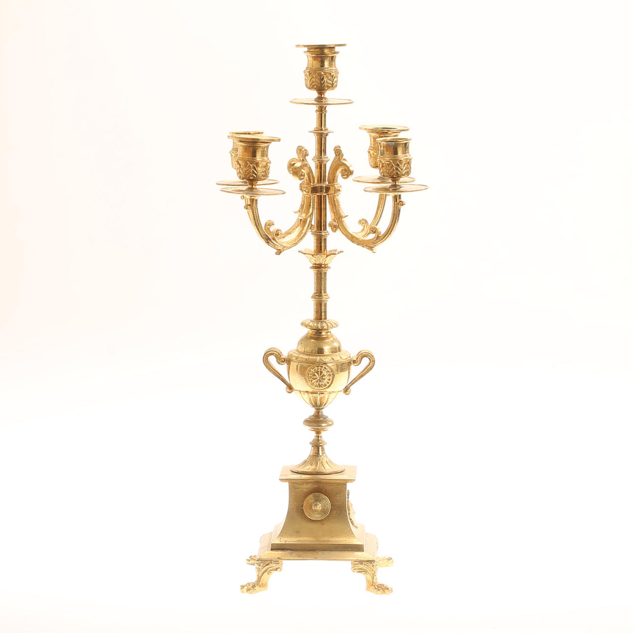 A brass candelabra, 19th century.
