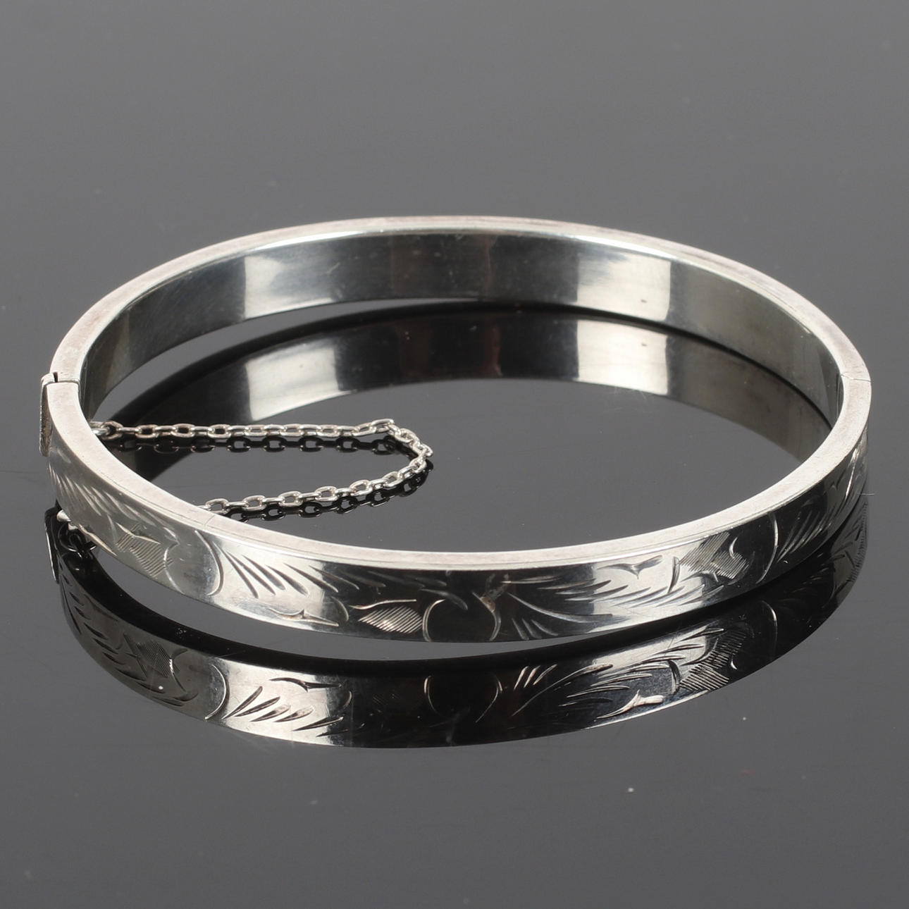 (6C05) A STERLING SILVER BANGLE. 20th century.