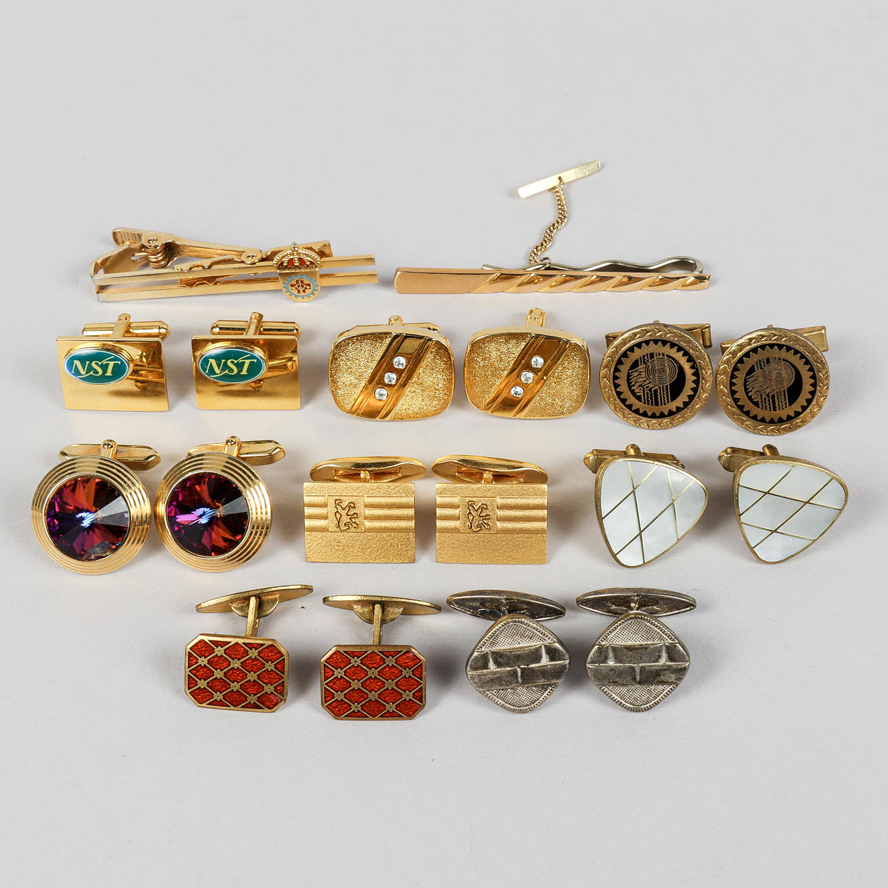 CUFFLINKS AND TIE PINS.