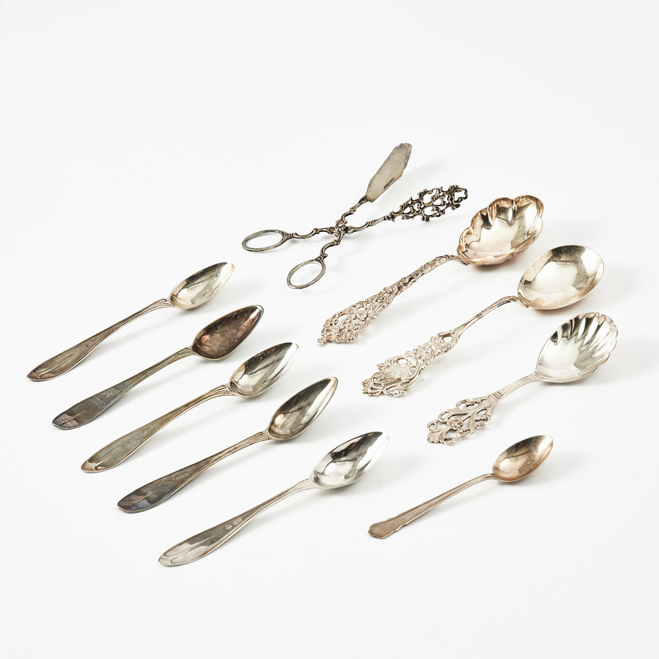 A 10 dlr silver serving spoon, mostly 20th century.